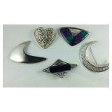 Five brooches
