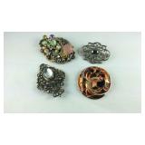 Four brooches