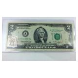 1976 $2 note with US postage cancellation stamp