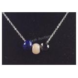 Lapis lazuli, black spinel, and pink moonstone