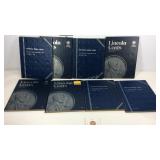 Eight partial Lincoln cent collection books