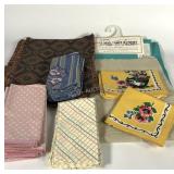 Table linens, three runners and several styles of