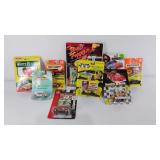 Eight Die-cast cars in original packaging and