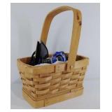 Basket with watches, sunglasses and key ring