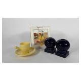 Fiesta ware, yellow cup & saucer, dark blue bulb