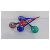 Five glass water globes, each 13" in length