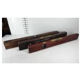 Three wooden levels, two Stanley, one Philada