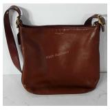 Brown coach purse, not authenticated by hash