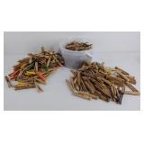 Group of clothespins, mostly wood, but some