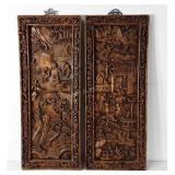 Two Asian inspired carved wooden wall hangings,