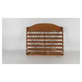 Spool and bobbin wall rack, 26" × 22.5" × 2", one