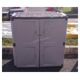 Rubbermaid  Storage Cabinet, doors lead to shelf