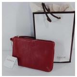 Coach wristlet, not authenticated by Hash