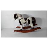 Playful plush rocking horse, includes sounds,