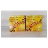 Two strands of autumn maple leaf lighted garland,