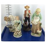 Four porcelain figurines