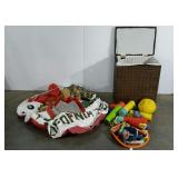 Hamper full of pool toys, includes Hydro-Blaster,