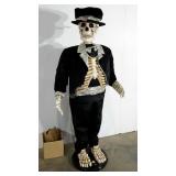 Singing animatronic skeleton, jaw moves, includes