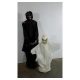 Battery operated ghost and ghoul, moves like a