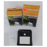 Two Solar LED Wall Lights, New in package
