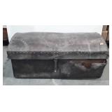 Leather wrapped trunk, hinges broken, leather