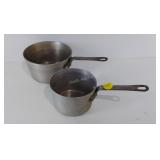 Two commercial Toroware saucepans