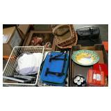 Skid lot: includes framed art, baskets, tins,
