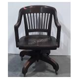 Wooden office chair, wobbly