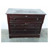 Wooden chest with drawers, has key holes on