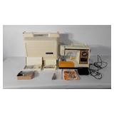 Kenmore sewing machine with case, foot pedal, and