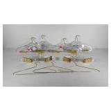 Hangers, brass tone and clear plastic