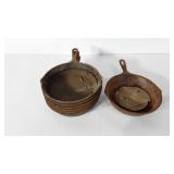 Seven lodge cast iron skillets, some are stuck