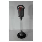 Parking meter coin bank, includes some coins,