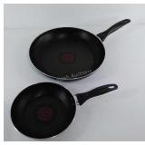 Two T-fal skillets, 12" and 8" in diameter