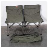 Two camping chairs, both are ripped on back side