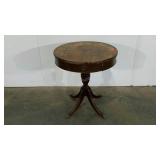 Round accent table, needs refinished, metal feet