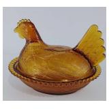 Amber glass Hen in Nest covered dish