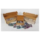 Two sleeves of sports trading cards, plus extra