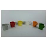 Six Fiestaware mugs, different colors