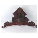 Piece of carved wood from a piece of furniture