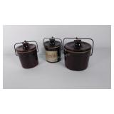 Three ceramic cheese crocks with lids, no rubber