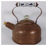 Copper tea kettle with ceramic handles