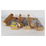 Three sleeves of sports trading cards, 1990,
