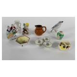 Porcelain and pottery group, Epphila bird,