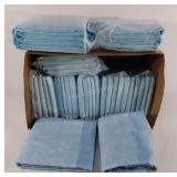 Bed protector pads, approximately 35