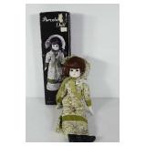 Porcelain doll in box, 19"