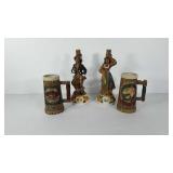 Barware, two figural decanters and two steins