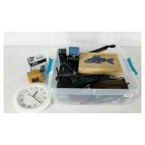 Plastic tote, clocks, wireless mouse, hair dryer,
