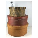 Three wooden storage boxes