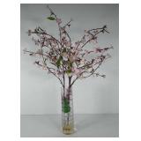 Glass vase of everlasting apple blossoms, vase is